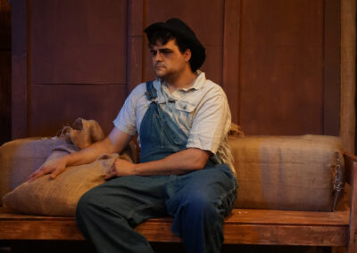 Gregory Crafts as Lennie Small in John Steinbeck's "Of Mice and Men" at Theatre Unleashed, directed by Aaron Lyons