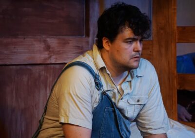 Lennie Small actor Gregory Crafts in John Steinbeck's "Of Mice and Men" at Theatre Unleashed, directed by Aaron Lyons